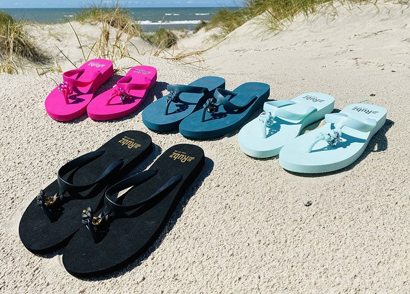 Flip flops från trendiga "The Rubz" Unisex - Svart och guldmetall