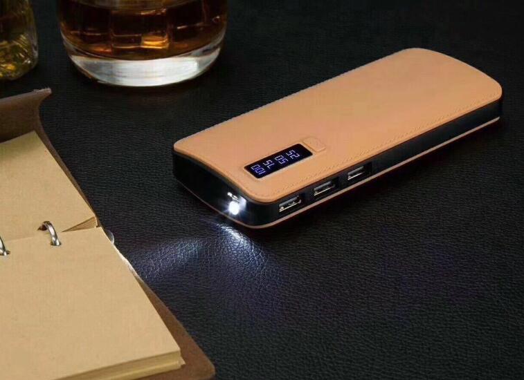 Liten smart Powerbank i läder (10000 mAh)